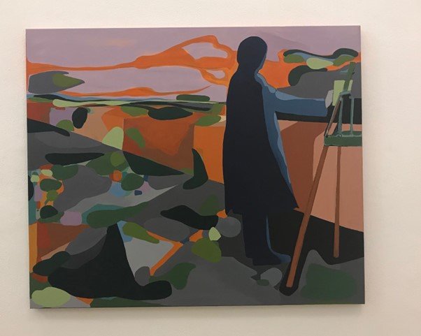 Imane Ibrahim painter at easel